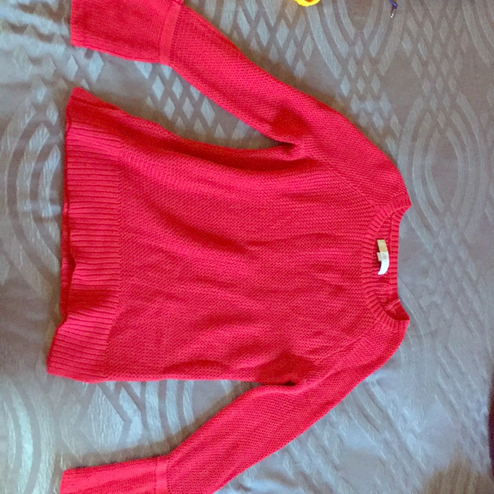 Red sweater with flared sleeves
